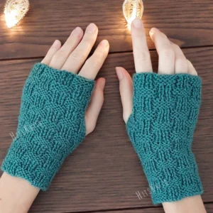 Checker Fingerless Gloves Knitting Pattern showing a pair of teal fingerless gloves with a checkerboard texture of garter and rib blocks and a thumb opening, worked in DK wool blend yarn, sizes S/M to L/XL.